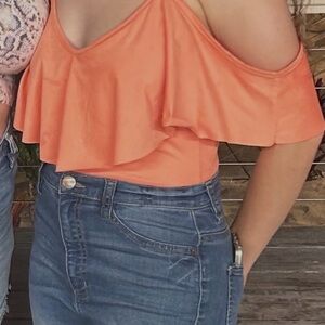 Charlotte Russe Coral cold shoulder body suit